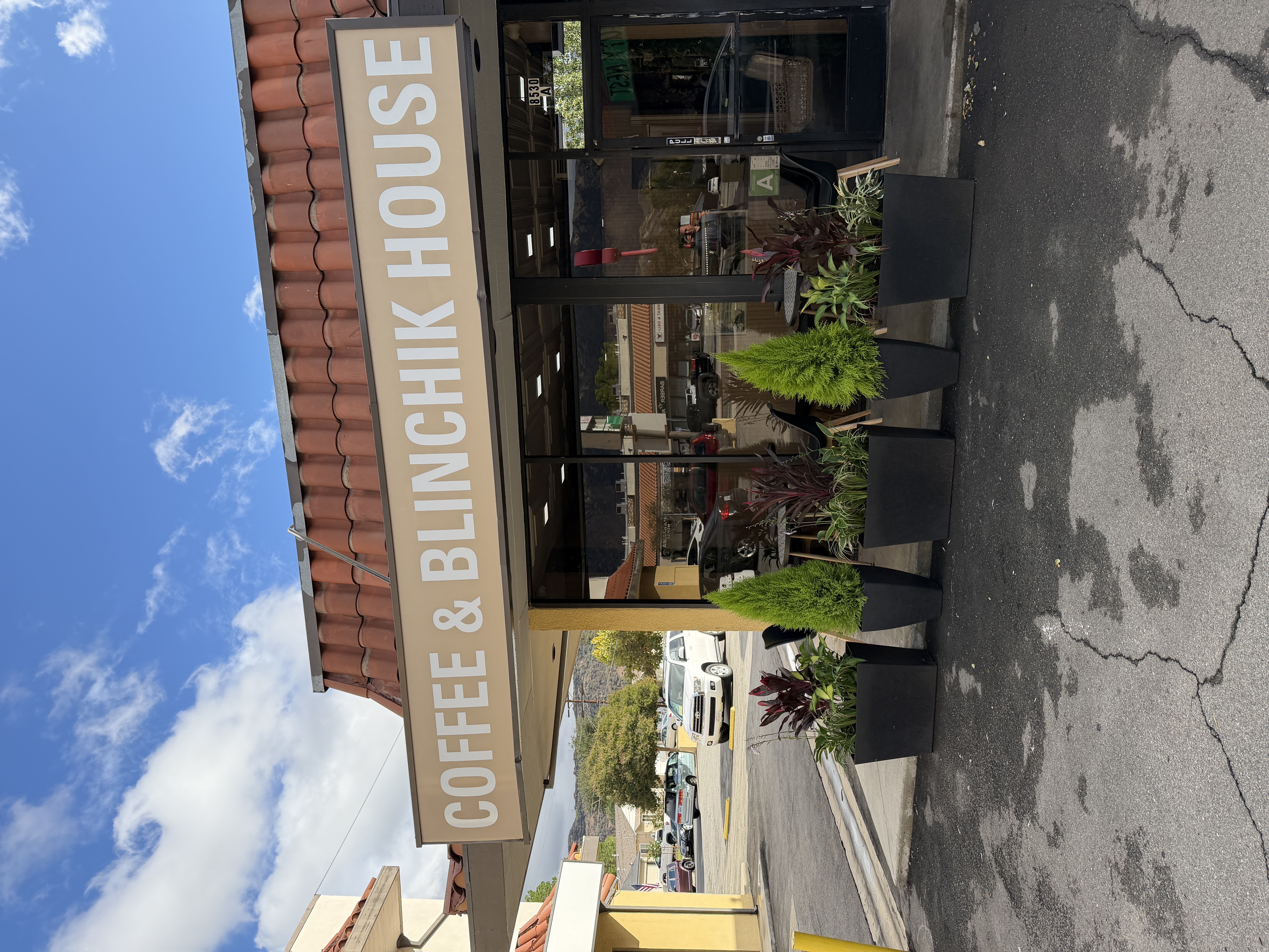 The clean and modern interior of the coffee shop counter.